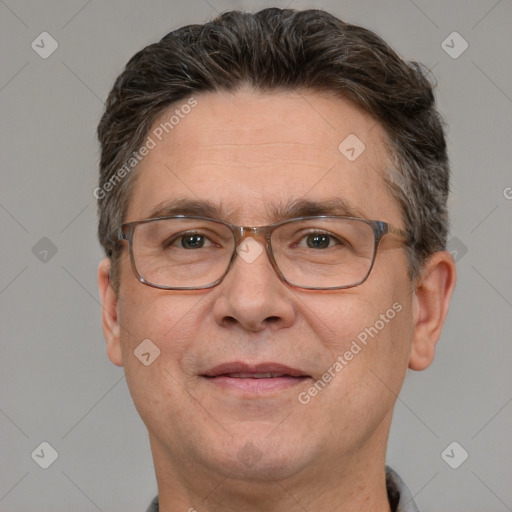 Joyful white middle-aged male with short  brown hair and brown eyes