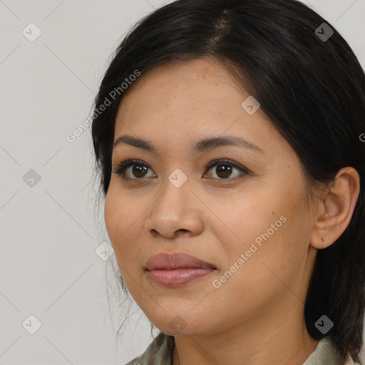 Joyful asian young-adult female with medium  brown hair and brown eyes