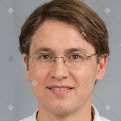 Joyful white adult male with short  brown hair and grey eyes