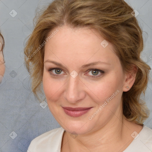 Joyful white adult female with medium  brown hair and blue eyes