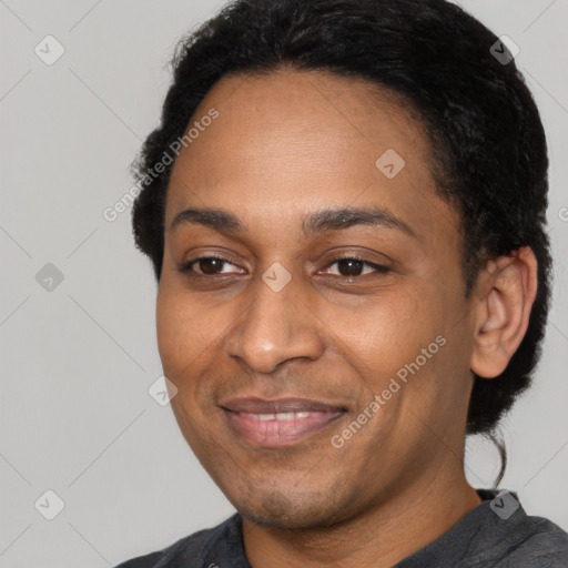 Joyful latino young-adult female with short  black hair and brown eyes