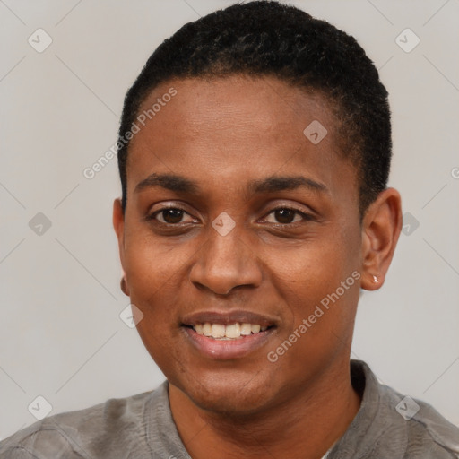 Joyful black young-adult male with short  black hair and brown eyes