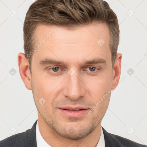 Joyful white adult male with short  brown hair and brown eyes