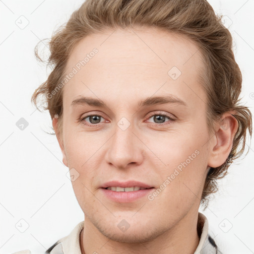 Joyful white young-adult female with short  brown hair and grey eyes