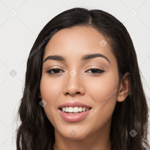 Joyful white young-adult female with long  black hair and brown eyes