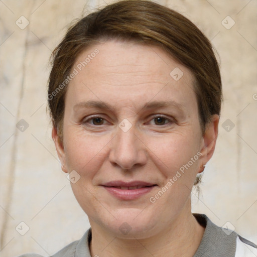 Joyful white adult female with short  brown hair and brown eyes