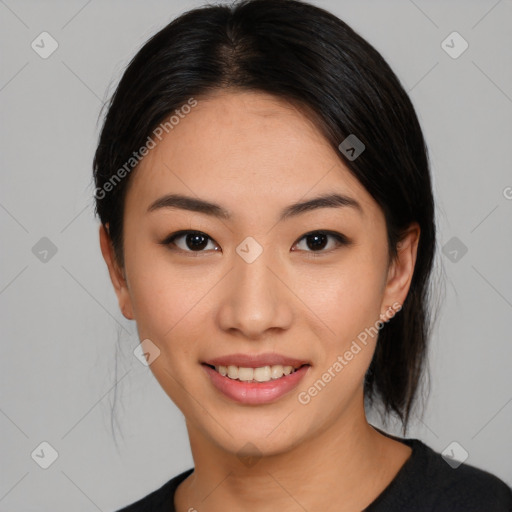 Joyful asian young-adult female with medium  black hair and brown eyes