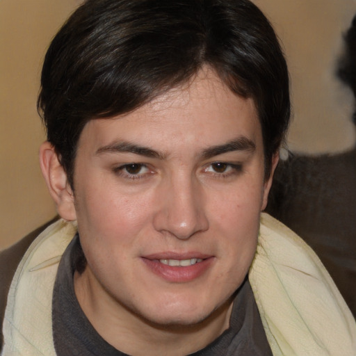 Joyful white young-adult male with medium  brown hair and brown eyes