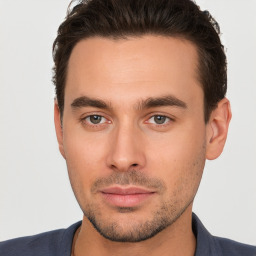Neutral white young-adult male with short  brown hair and brown eyes