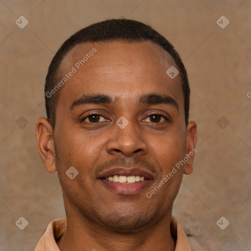 Joyful latino young-adult male with short  brown hair and brown eyes