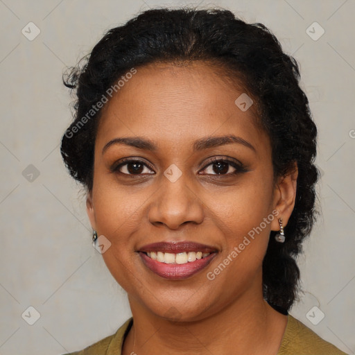 Joyful black young-adult female with medium  brown hair and brown eyes