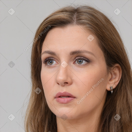 Neutral white young-adult female with long  brown hair and grey eyes