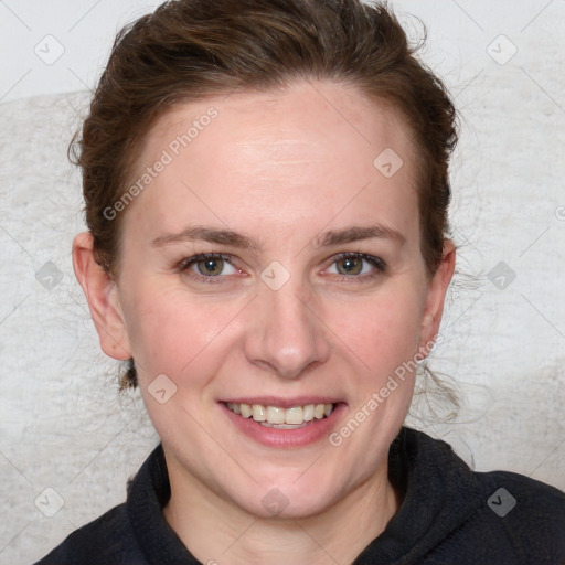 Joyful white young-adult female with medium  brown hair and blue eyes