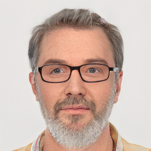 Neutral white middle-aged male with short  gray hair and brown eyes