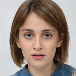 Neutral white young-adult female with medium  brown hair and grey eyes