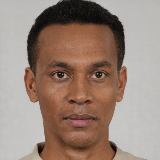 Neutral black young-adult male with short  black hair and brown eyes