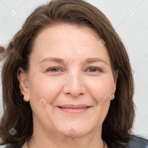 Joyful white adult female with medium  brown hair and grey eyes