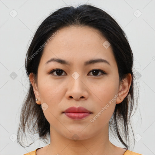 Joyful asian young-adult female with medium  brown hair and brown eyes