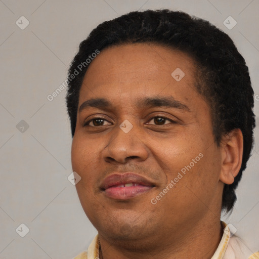 Joyful latino young-adult male with short  black hair and brown eyes