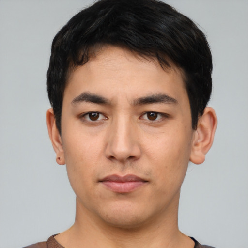 Neutral white young-adult male with short  black hair and brown eyes