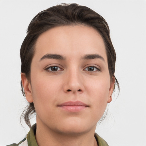 Neutral white young-adult female with medium  brown hair and brown eyes