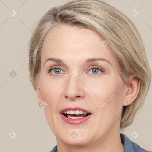 Joyful white adult female with medium  brown hair and grey eyes