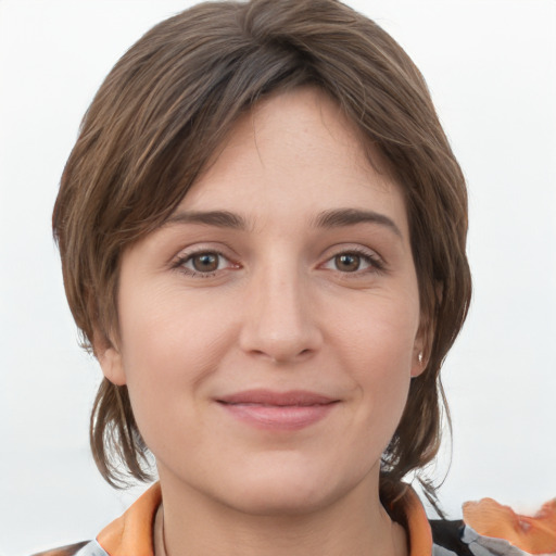 Joyful white young-adult female with medium  brown hair and grey eyes