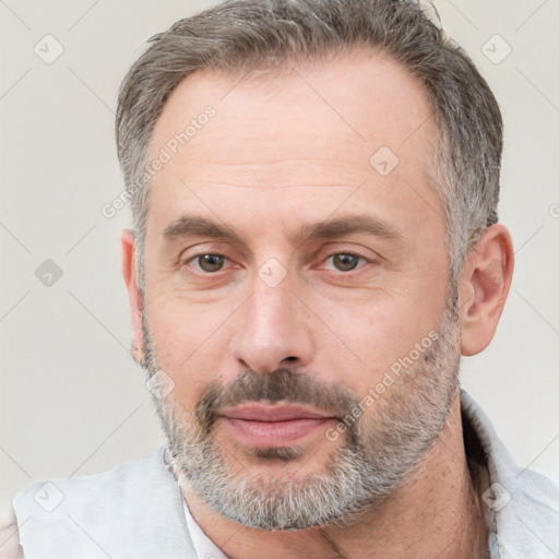 Neutral white adult male with short  brown hair and brown eyes