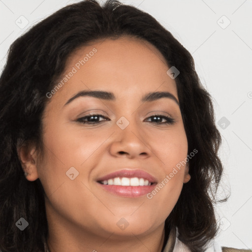 Joyful latino young-adult female with long  brown hair and brown eyes