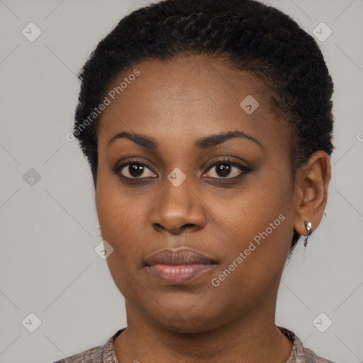 Neutral black young-adult female with short  brown hair and brown eyes