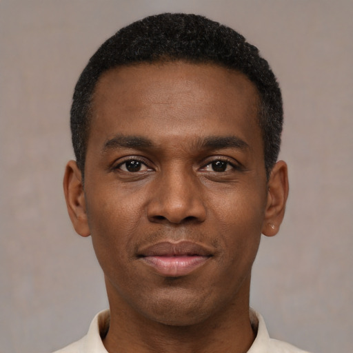 Neutral black young-adult male with short  black hair and brown eyes