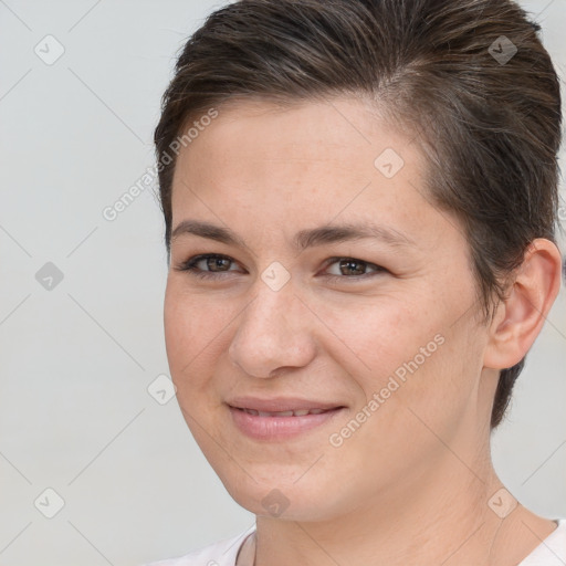 Joyful white young-adult female with short  brown hair and brown eyes