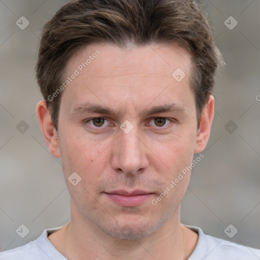 Neutral white adult male with short  brown hair and grey eyes