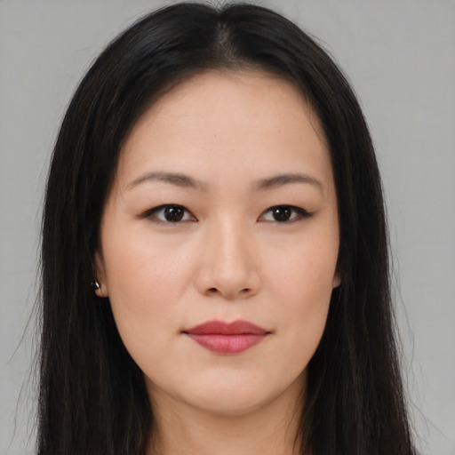 Neutral asian young-adult female with long  brown hair and brown eyes