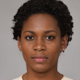 Neutral black young-adult female with short  black hair and brown eyes