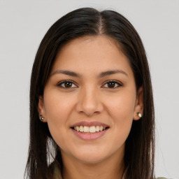 Joyful white young-adult female with long  brown hair and brown eyes