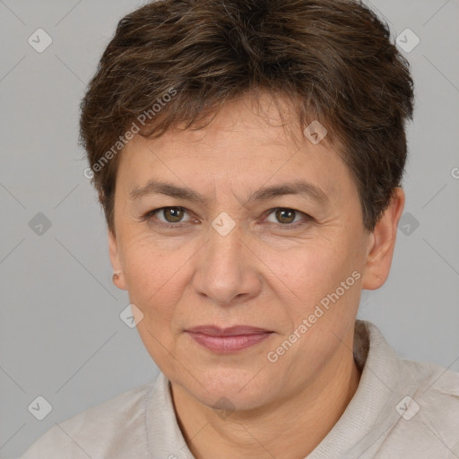 Joyful white adult female with short  brown hair and brown eyes