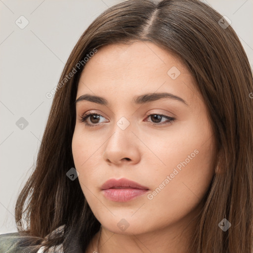 Neutral white young-adult female with long  brown hair and brown eyes