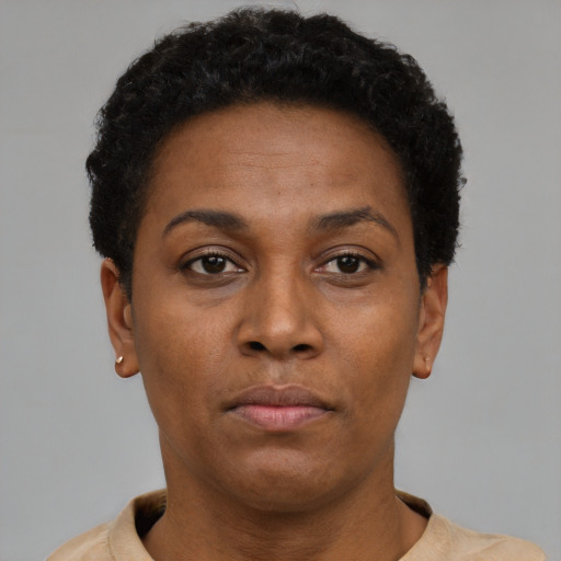 Neutral black adult female with short  brown hair and brown eyes