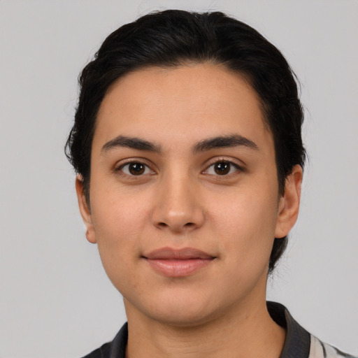 Neutral latino young-adult female with medium  black hair and brown eyes