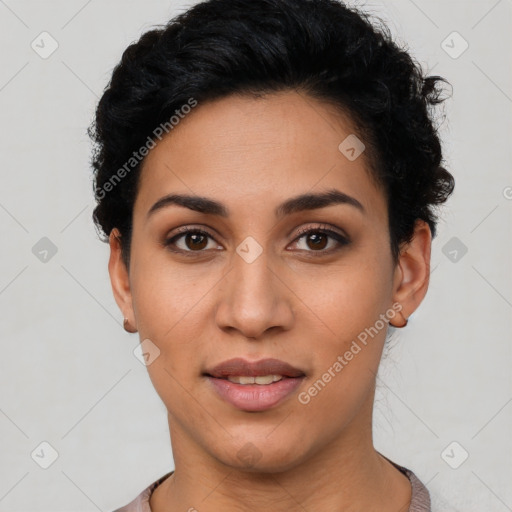 Joyful latino young-adult female with short  black hair and brown eyes