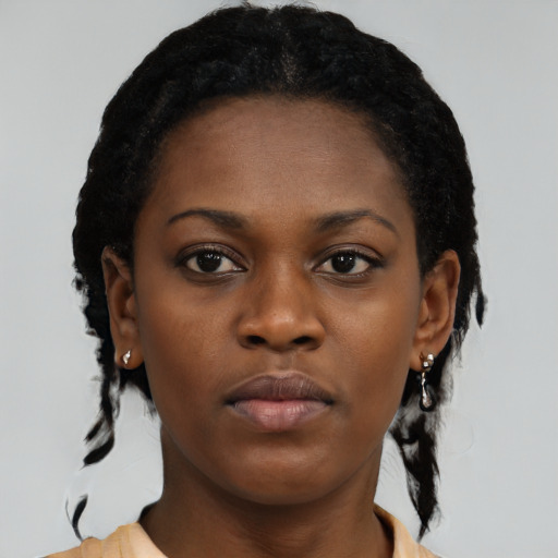 Neutral black young-adult female with short  black hair and brown eyes