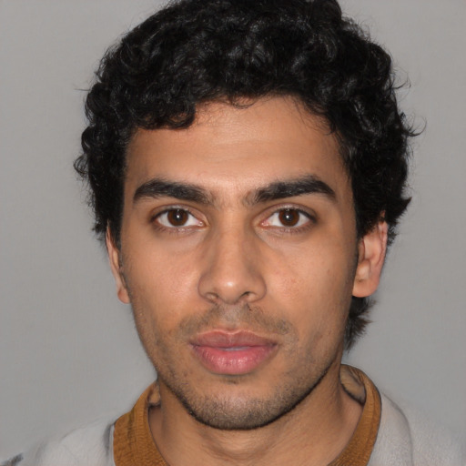 Neutral latino young-adult male with short  brown hair and brown eyes