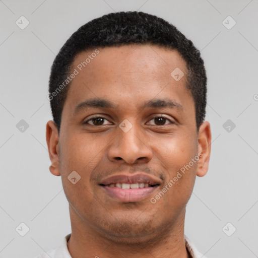 Joyful latino young-adult male with short  brown hair and brown eyes