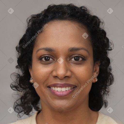 Joyful black young-adult female with medium  brown hair and brown eyes