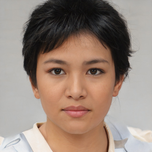 Neutral asian young-adult female with medium  brown hair and brown eyes