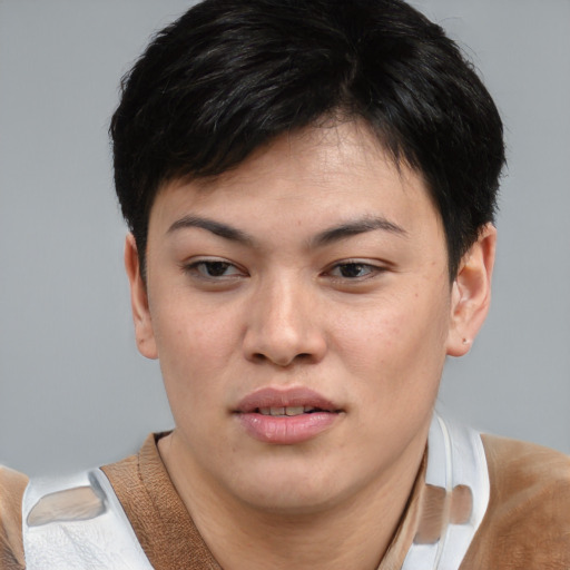 Joyful asian young-adult female with short  brown hair and brown eyes