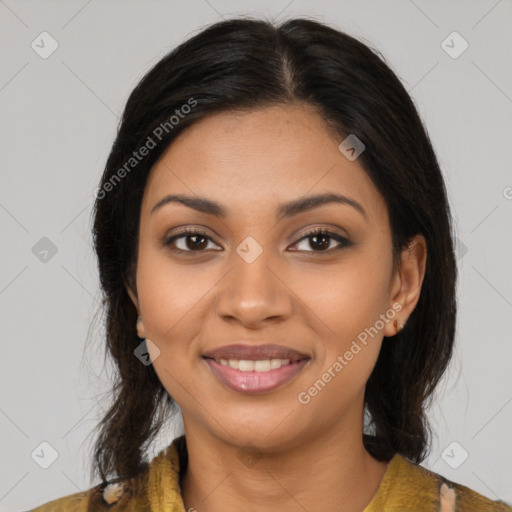 Joyful latino young-adult female with medium  brown hair and brown eyes