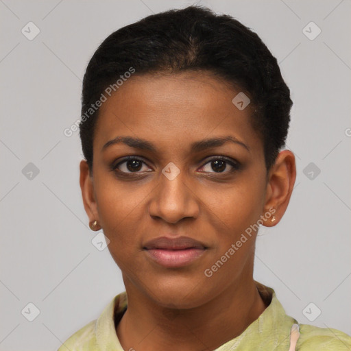 Joyful black young-adult female with short  black hair and brown eyes