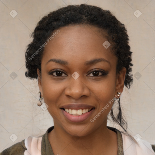 Joyful black young-adult female with medium  black hair and brown eyes